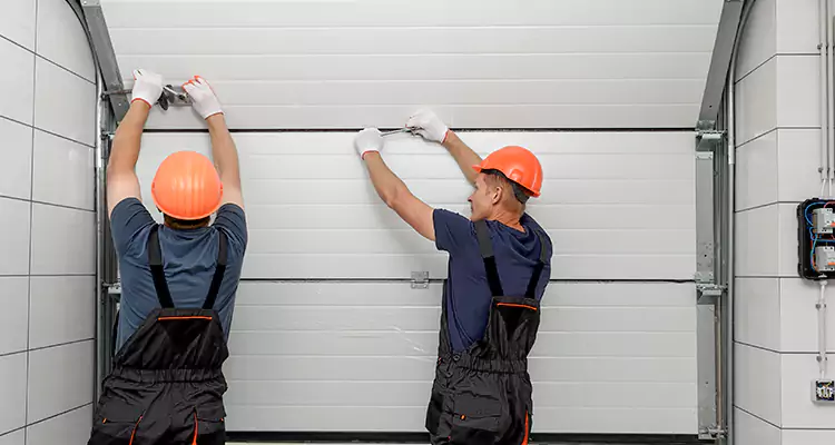 Garage Door Bottom Panel Repair in Land O' Lakes, FL